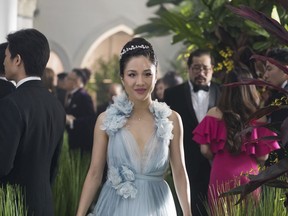 This image released by Warner Bros. Pictures shows Constance Wu in a scene from "Crazy Rich Asians," in theaters on August 17.