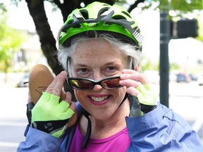 Former minister of health, Dr. Margaret MacDiarmid outside on her bike, in arrives for an interview by bicycle.