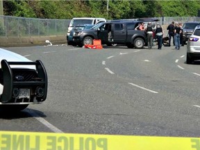 Police at the Departure Bay Ferry Terminal in Nanaimo, B.C., May 8, 2018. A suspect was shot after police pulled him over as he disembarked from a ferry at the terminal.