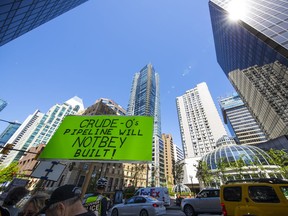 Protesters gathered outside the TD Bank tower at Georgia and Howe streets in Vancouver on May 12 to protest against TD and other banks financing the Kinder Morgan pipeline.