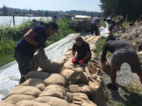 Scenes from the Fraser River, which is expected to flood as the river level rises from a rapid snowmelt.