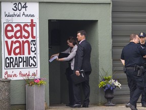 Police investigate a shooting in a home on Industrial Avenue in Vancouver on May 18, 2018.