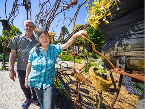 Gardener Sharon Slack and executive director Michael Levenston show off the City Farmer education centre on May 23 in Vancouver.