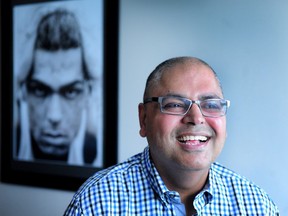 Alex Sangha, Meritorious Service Medal recipient for his advocacy work with the South Asian LGBTQ community, at his Surrey condo.