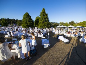 Le Dîner en Blanc, Vancouver's most exclusive flash mob, is returning to Vancouver. Participants are pictured attending the 2017 edition of the dinner.