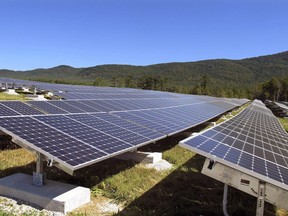 In this Sept. 15, 2015 file photograph, a portion of the Stafford Hill solar power project gathers energy from the sun in Rutland, Vt.
