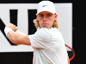 Denis Shapovalov returns a ball to Tomas Berdych during the Italian Open in Rome, Tuesday, May 15, 2018. (Ettore Ferrari/ANSA via AP)