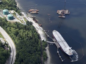 A aerial view of Kinder Morgan's Trans Mountain marine terminal, in Burnaby, B.C., is shown on Tuesday, May 29, 2018. The federal Liberal government is spending $4.5 billion to buy Trans Mountain and all of Kinder Morgan Canada's core assets, Finance Minister Bill Morneau said Tuesday as he unveiled the government's long-awaited, big-budget strategy to save the plan to expand the oilsands pipeline.THE CANADIAN PRESS Jonathan Hayward ORG XMIT: JOHV103