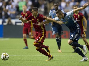Jake Nerwinski of the Vancouver Whitecaps, right, hopes he and his teammates won't be doing all the chasing in the MLS standings this season.