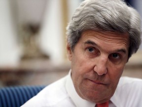 In this Jan. 15, 2017 file photo, U.S. Secretary of State John Kerry speaks with the media after attending the Mideast peace conference in Paris, France.