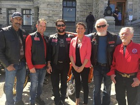 Advanced Minister Melanie Mark with Florian's Knights at May 10 MLA ride of the B.C. Coalition of Motorcyclists. Knights founder Nick Elmes is third from the left, beside Mark.