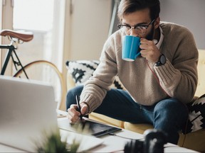 Tired man takes another coffee because he will work untill late hours. (Anchiy/Sun Media)