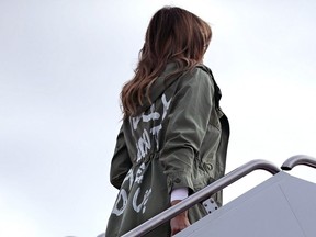 U.S. first lady Melania Trump boards an Air Force plane before traveling to Texas to visit facilities that house and care for children taken from their parents at the U.S.-Mexico border June 21, 2018 at Joint Base Andrews, Maryland.