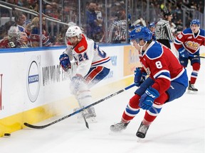 Defenceman Ty Smith of the Spokane Chiefs, left, is expected to be the first WHL player selected in the NHL Entry Draft.