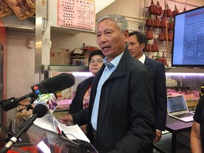 Steve Lee, spokesperson for Chinatown Voices, at a news conference Monday, June 4 at Dollar Meat Store, Chinatown. Photo: Kevin Griffin [PNG Merlin Archive]