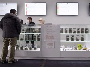 Various marijuana products are pictured at a dispensary in Vancouver, Thursday, Jan. 30, 2018. On the day Canadians can legally buy and use recreational marijuana the clock will start ticking on the future of cannabis dispensaries already open across the country, say politicians and pot industry insiders.