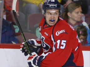 Hurricanes Jordy Bellerive celebrates a first period goal during WHL action between the Lethbridge Hurricanes and the Calgary Hitmen in Calgary, Alta at the Scotiabank Saddledome on Wednesday December 30, 2015. Jim Wells/Postmedia Network