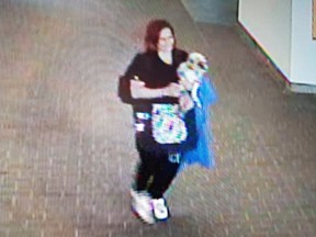 Police say this person is suspected of walking away with a small dog from New Westminster Skytrain station on June 1 at around 6:15 p.m.