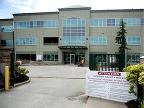 A former RCMP building on 76th Avenue that is being retrofitted to become the new Vancouver Immigration Holding Centre.