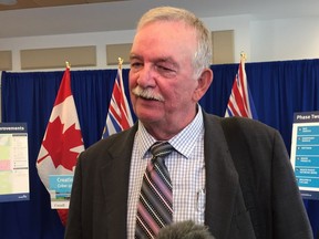 Burnaby Mayor Derek Corrigan, who is also chairman of the Mayors' Council, speaks to media June 28, 2018, after the second phase of the mayors' 10-year plan for regional transportation was approved. (Jennifer Saltman/PNG)