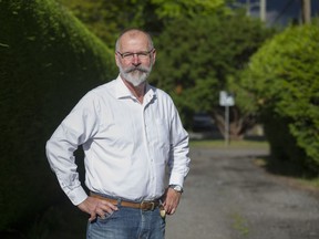 Entrepreneur Duane Laird in a westside neighbourhood where laneway housing is allowed, Vancouver June 14 2018.