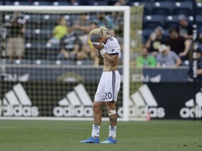 Vancouver Whitecaps' Brek Shea reacts after Saturday's MLS soccer match against the Philadelphia Union in Chester, Pa.