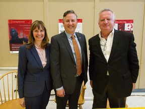 From left, Vanocuver mayoral candidates Shauna Sylvester, Kennedy Stewart and Patrick Condon pose during a debate at a COPE  nomination meeting at Holy Trinity Anglican Church in Vancouver.