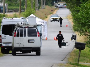 Mounties at the murder scene on Tuesday.