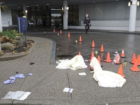 Police cars surrounding the Sheraton Hotel in Surrey, where one person was stabbed early Thursday morning, in Surrey, June 14, 2018.