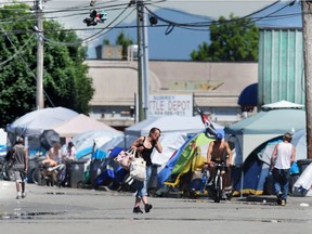 Tents lined up on 135A Street in Surrey, June 17, 2018.