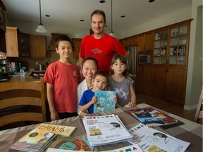 Dad, Chuck Precourt, mom, Evelyn Moi with kids Theodore 10, Eleanor 7, Julien 4, at their home in Langley, BC, June 21, 2018.