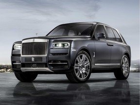 This photo provided by BMW Group shows the Rolls-Royce Cullinan. Rolls-Royce unveiled The Cullinan, its first SUV on Thursday, May 10, 2018. Named for the diamond in Britain's Crown Jewels, it carries a $325,000 price tag plus an estimated $5,000 gas-guzzler tax.  (BMW Group via AP) ORG XMIT: NY108