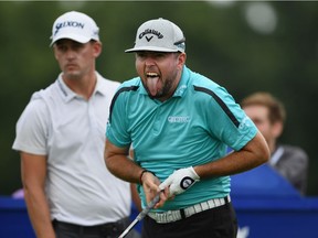 Robert Garrigus reacts to his tee shot on the 17th tee during the first round of the RBC Canadian Open at Glen Abbey Golf Club on Thursday, July 26, 2018 in Oakville, Ont.