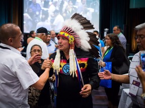 Perry Bellegardemeets with supporters after being re-elected as the National Chief of the Assembly of First Nations in Vancouver on Wednesday.