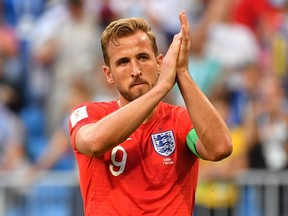 England's forward Harry Kane applauds at the end of the Russia 2018 World Cup quarter-final football match between Sweden and England at the Samara Arena in Samara on July 7, 2018.
