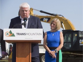 Kinder Morgan Canada president Ian Anderson and Alberta Premier Rachel Notley speak during a ground breaking ceremony at the Trans Mountain stockpile site on the Enoch First Nation near Edmonton.