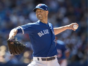 Toronto Blue Jays starting pitcher J.A. Happ works during first inning American League MLB baseball action against the New York Yankees, in Toronto on Saturday, July 7, 2018.