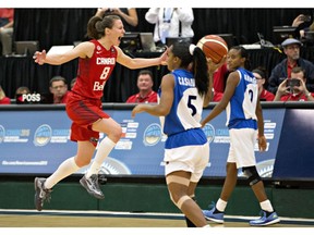 Canada's Kim Gaucher, left, celebrates the team's win over Cuba during second half action of the 2015 FIBA Americas Women's Championship Final in Edmonton, Alta., on Sunday, August 16, 2015.