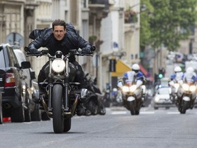This image released by Paramount Pictures shows Tom Cruise in a scene from "Mission: Impossible - Fallout." (Chiabella James/Paramount Pictures and Skydance via AP) ORG XMIT: NYET116