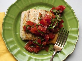 A plate of pan-seared fish with tomato basil relish, from a recipe by Katie Workman.