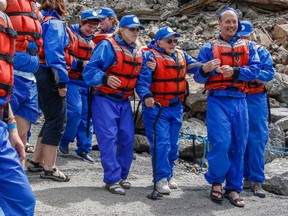 Surrey's Hazel Amos, 96, is an avid whitewater rafter who challenges other seniors to lead active lives and hopes to get recognized by Guinness World Records. Here she's being helped to a raft last summer by her son Robert and a family friend.