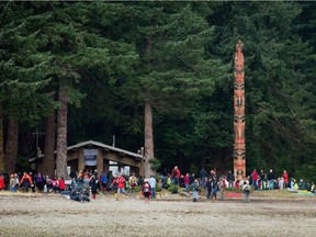The Gwaii Haanas legacy totem pole is seen after being raised in Windy Bay, B.C., on Lyell Island in Haida Gwaii on Thursday August 15, 2013. Despite a declining population, the archipelago's largest village of Queen Charlotte has almost no vacancy and both council and a housing report have pointed to Airbnb and increased tourism as a problem.