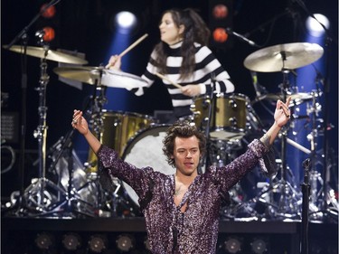 Former One Direction singer Harry Styles performs during his debut solo tour at Rogers Arena in Vancouver on Friday, July 6, 2018.