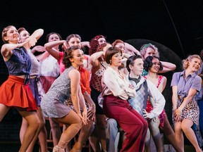 Paige Fraser (Peggy, in blue romper), Janet Gigliotti (Dorothy, in red pants), Blake Sartin (Billy Lawlor, in sweater vest) perform with the cast of 42nd Street at Theatre Under the Stars.