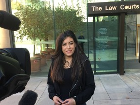 Mary Hare, a UBC student attacked by a knife-wielding assailant inside her dorm, is pictured outside court in 2017. She has launched a lawsuit against the University of B.C. over the incident.