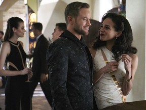 Killjoys Season 4, Episode 1. Johnny Jaqobis (Aaron Ashmore) and Yelena 'Dutch' Yardeen (Hannah John-Kamen) check in.