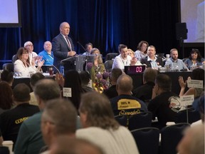 Premier John Horgan at a BCGEU convention. The union representing most workers in core government operations has a tentative deal for a new contract. But it has yet to be ratified and non-teaching staff in B.C. schools have rejected a similar proposed deal.