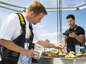 We've all heard of dinner and a show. But what about brunch, lunch and dinner with a seriously epic view? Chef Ned Bell puts the finishing touches on a dish while suspended 130 feet in the air.