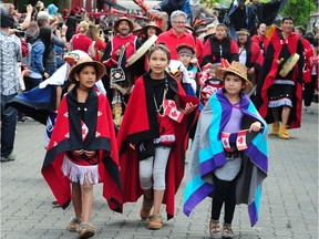 Parade performers during Canada Day festivities on Granville Island in Vancouver, BC. July 1, 2018.