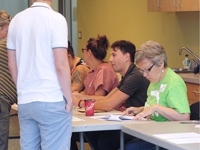 Vision Vancouver members cast their votes for the team of candidates who will run with Mayoral Candidate Ian Campbell in October.